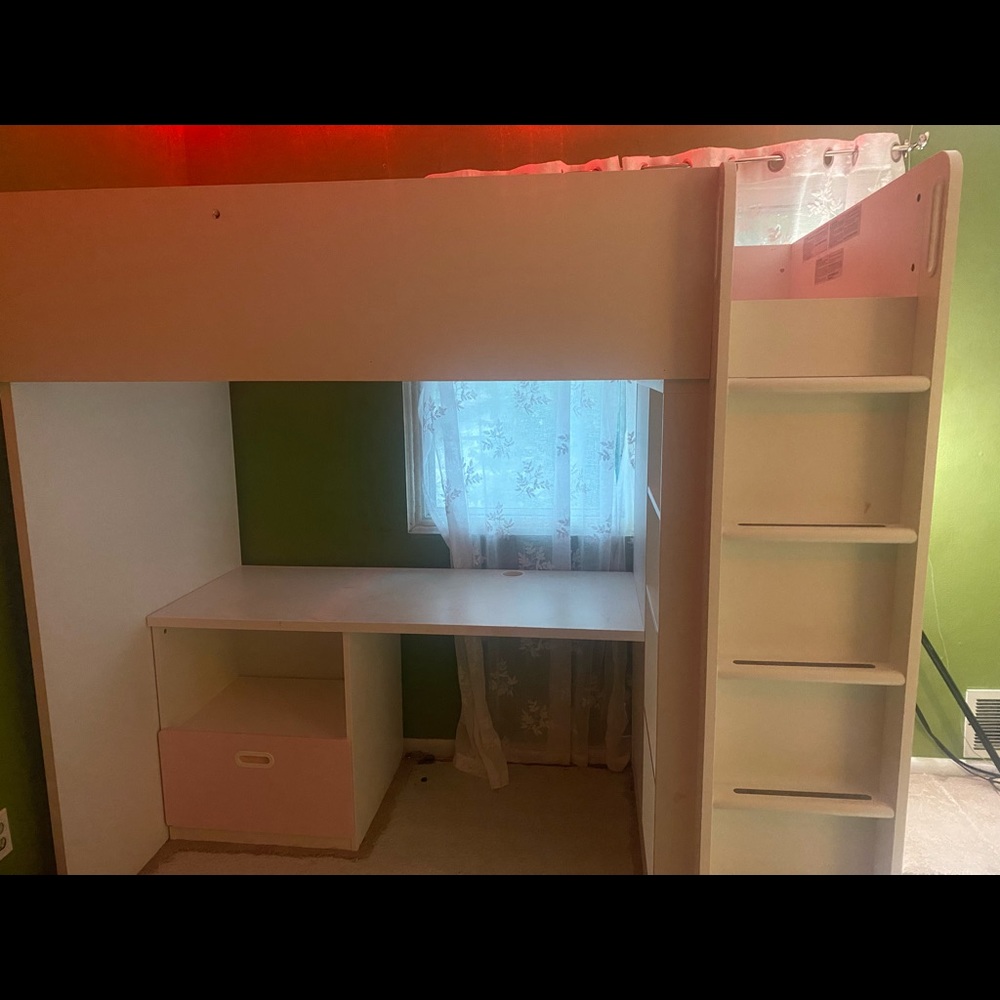 Loft bed, pink and white has drawers and table